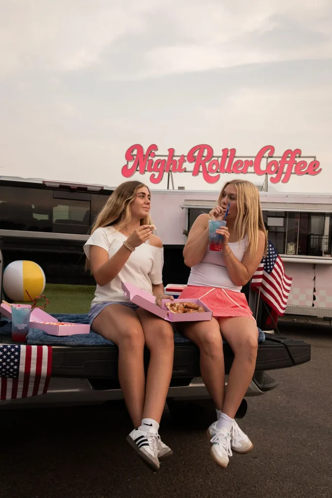 Guests enjoying drinks from the Night Roller trailer